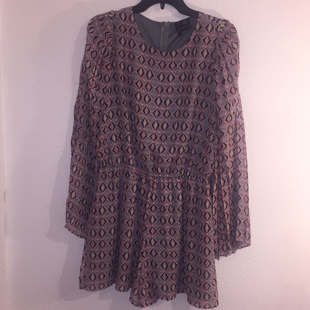 Long sleeved short one piece. Very light. 32.5 in